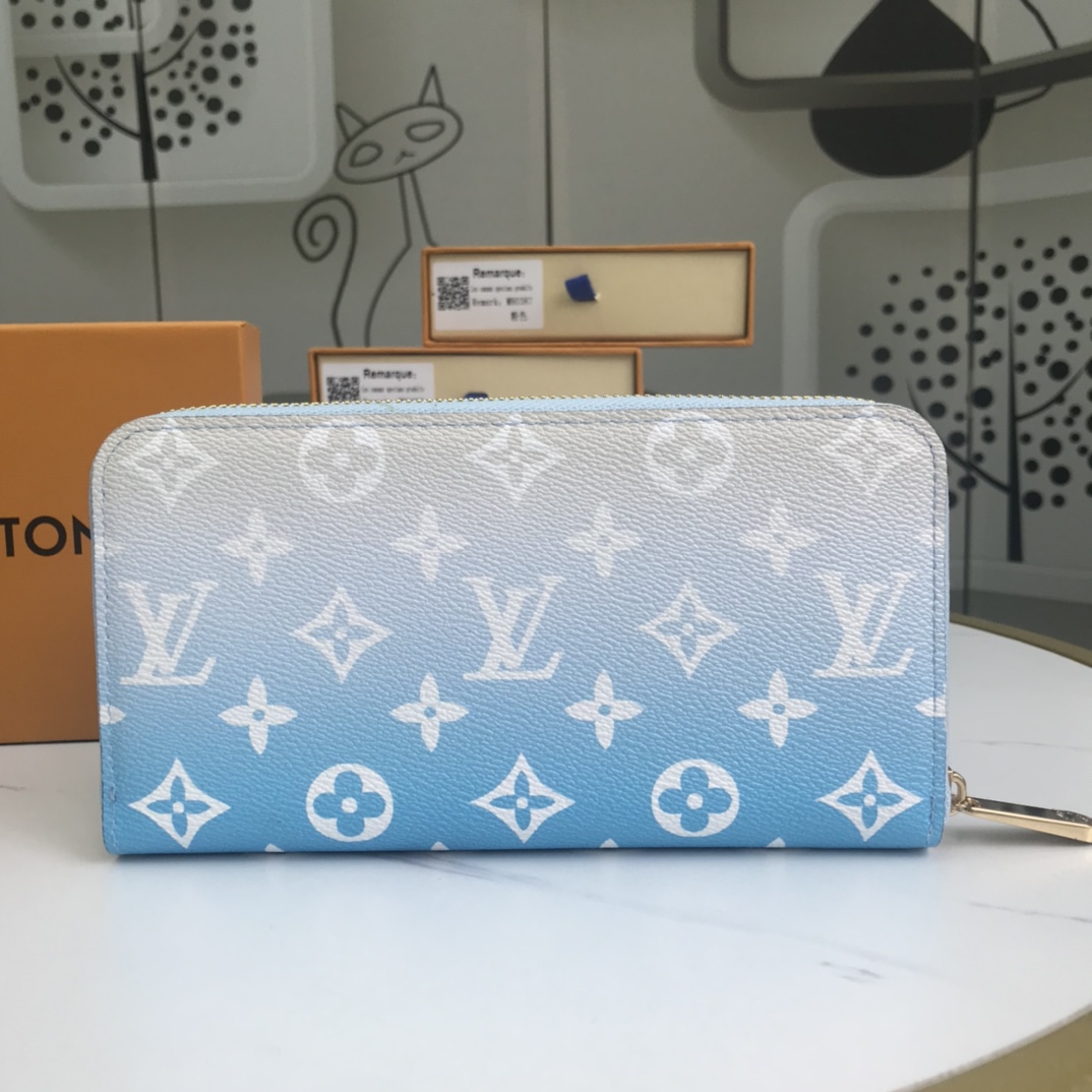 Louis Vuitton junto a la billetera de la piscina M80360-2