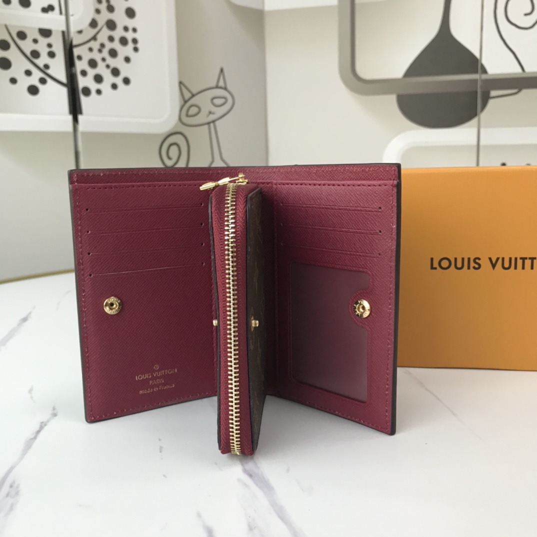 billetera Louis Vuitton con compartimento postal M86366-9