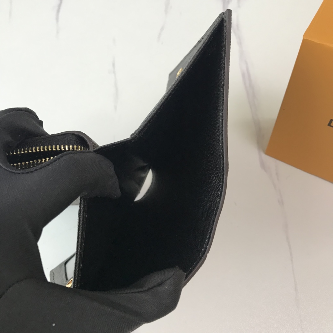 billetera Louis Vuitton con compartimento postal M86366-15