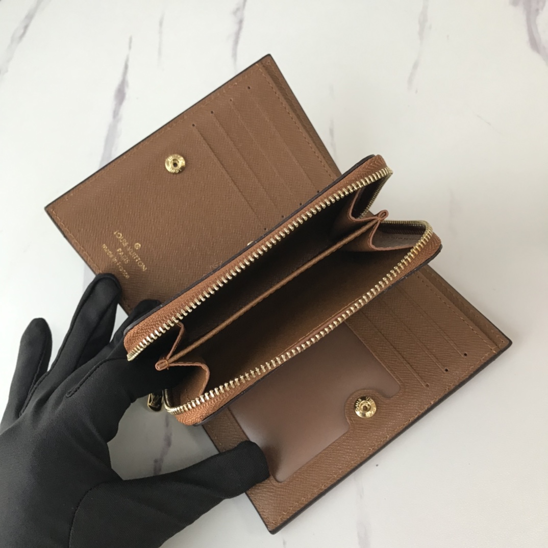 billetera Louis Vuitton con compartimento postal M86366-18