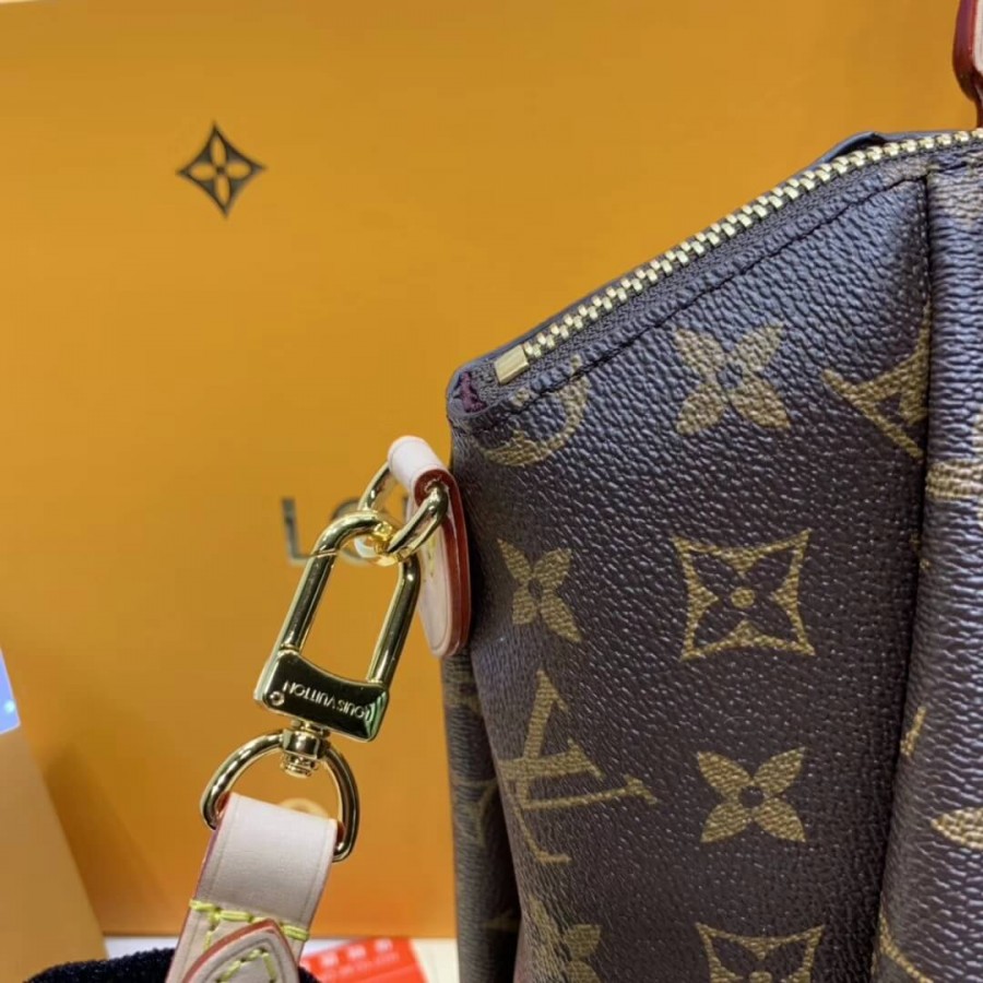 Louis Vuitton Monogram Canvas Rivoli MM M44546-9