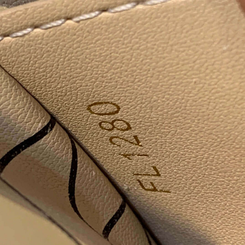 Louis Vuitton VERTICAL TUNK POCHETTE M63913-11