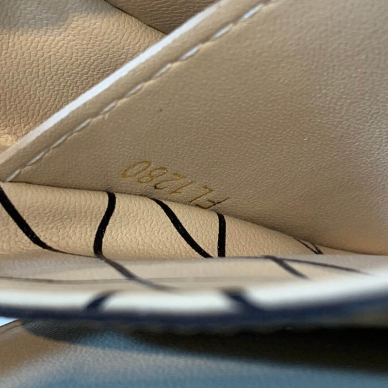 Louis Vuitton VERTICAL TUNK POCHETTE M67873-11