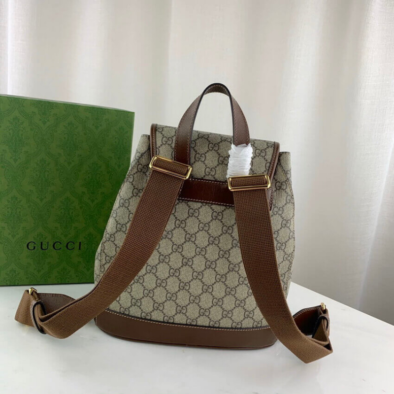mochila Gucci con g de enclavamiento en GG Supreme 674147-4