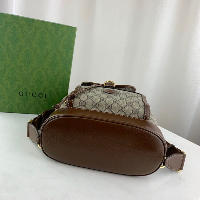mochila Gucci con g de enclavamiento en GG Supreme 674147-5